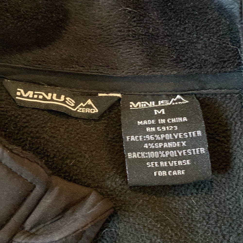 Minus‎ zero Womens full zip high neck black jacket.